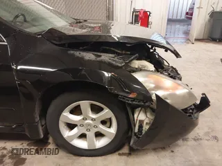 2007 Nissan Altima S with VIN 1N4AL21E77C144161, listed as a IAAI auction lot 42011479 with 175,942 mi miles and . Bid and sale history available at carsss.com. Image 18.