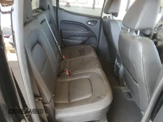 2021 GMC Canyon 4WD AT4 w/Cloth with VIN 1GTG6FEN1M1295551, listed as a Copart auction lot 74900294 with 39,853 mi miles and Salvage Title. Bid and sale history available at carsss.com. Image 10.