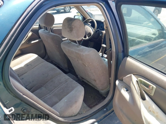 1998 Toyota Camry LE z VIN 4T1BF22K1WU927328, wystawiony jako IAAI lot #42534974 z przebiegiem 74 368 mil mil oraz . Historia ofert i sprzedaży dostępna na DreamBid. Obrazek 8.