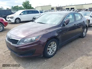 2011 Kia Optima LX with VIN KNAGM4A73B5063778, listed as a IAAI auction lot 39932051 with 143,175 mi miles. Bid and sale history available at carsss.com. Image 2.