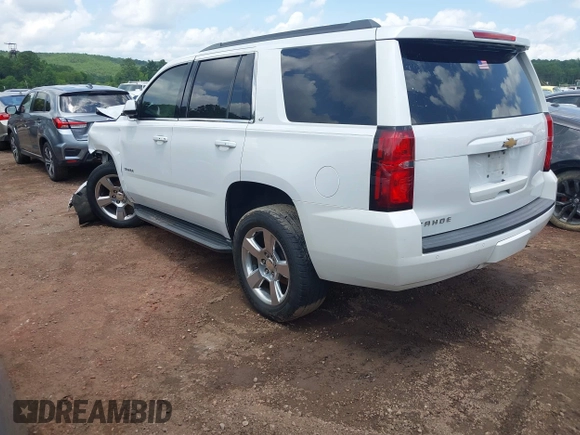 2016 Chevrolet Tahoe LT with VIN 1GNSCBKC9GR459057, listed as a IAAI auction lot 42541097 with 82,203 mi miles and . Bid and sale history available at DreamBid. Image 3.