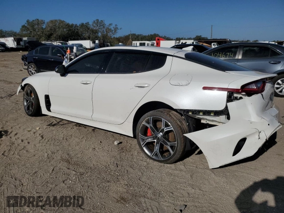 2021 Kia Stinger GT2 with VIN KNAE55LC1M6089121, listed as a Copart auction lot 74823434 with 25,009 mi miles and Salvage Title. Bid and sale history available at carsss.com. Image 2.