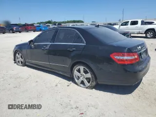 2011 Mercedes-Benz E-Class E 350 Luxury with VIN WDDHF5GB4BA297704, listed as a Copart auction lot 53492705 with 222,195 mi miles and Salvage Title. Bid and sale history available at carsss.com. Image 2.