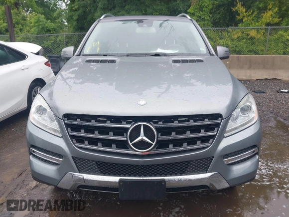 2014 Mercedes-Benz M 350 z VIN 4JGDA5HBXEA404597, wystawiony jako IAAI lot #42346070 z przebiegiem 123 987 mil mil oraz . Historia ofert i sprzedaży dostępna na DreamBid. Obrazek 13.