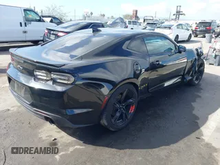 2020 Chevrolet Camaro 1LT with VIN 1G1FB1RS2L0145228, listed as a IAAI auction lot 41720759 with 69,713 mi miles and . Bid and sale history available at carsss.com. Image 4.