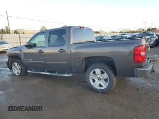 2007 Chevrolet Silverado 1500 Work Truck with VIN 2GCEC13J571550686, listed as a Copart auction lot 86720974 with 141,136 mi miles and Salvage Title. Bid and sale history available at DreamBid. Image 2.