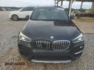 2016 BMW X1 xDrive28i z VIN WBXHT3C33G5E54568, wystawiony jako Copart lot #55316805 z przebiegiem 159 232 mil mil oraz Szkoda całkowita • Salvage title. Historia ofert i sprzedaży dostępna na DreamBid. Obrazek 5.