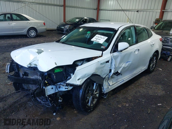 2019 Kia Optima LX with VIN 5XXGT4L33KG363512, listed as a IAAI auction lot 41824631 with 105,034 mi miles. Bid and sale history available at carsss.com. Image 18.