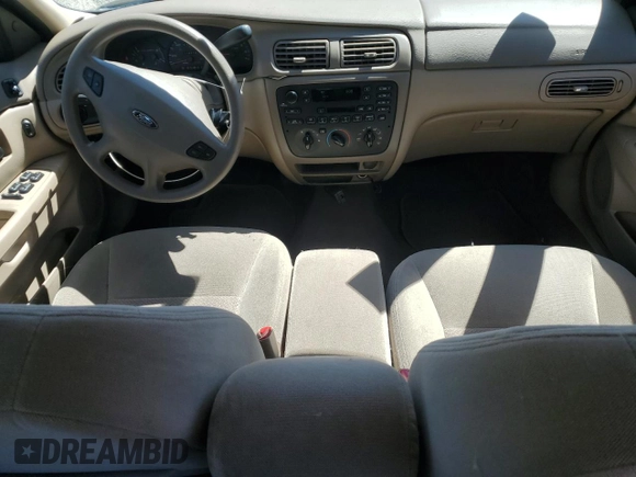 2003 Ford Taurus LX Standard z VIN 1FAFP52U63G277370, wystawiony jako Copart lot #56184345 z przebiegiem 115 778 mil mil oraz Szkoda całkowita • Salvage title. Historia ofert i sprzedaży dostępna na DreamBid. Obrazek 8.