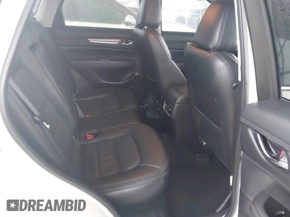 2023 Mazda CX-5 2.5 S Premium Package with VIN JM3KFBDM7P0165562, listed as a IAAI auction lot 41458088 with 35,168 mi miles. Bid and sale history available at carsss.com. Image 8.