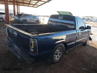 2000 Chevrolet Silverado 1500 with VIN 1GCEC14WXYZ170472, listed as a IAAI auction lot 40407202 with 210,513 mi miles. Bid and sale history available at carsss.com. Image 4.