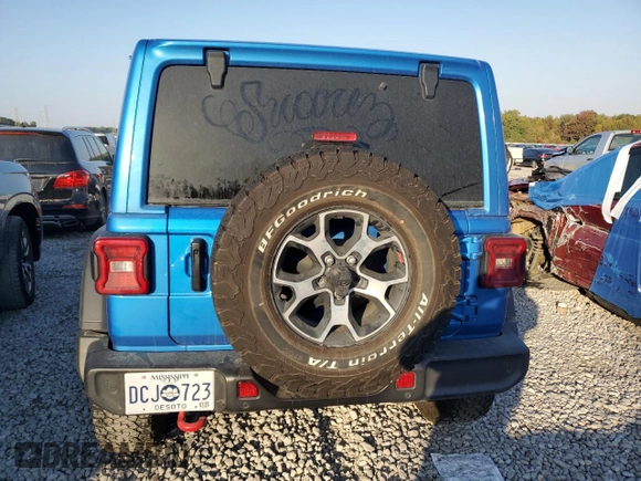 2022 Jeep Wrangler Unlimited Rubicon with VIN 1C4HJXFG8NW106102, listed as a Copart auction lot 77374814 with 45,546 mi miles and Salvage title. Bid and sale history available at DreamBid. Image 6.