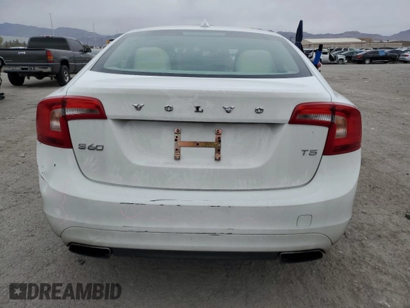 2015 Volvo S60 T5 Drive-E Premier z VIN YV140MFB2F1315820, wystawiony jako Copart lot #48077765 z przebiegiem 116 473 mil mil oraz Szkoda całkowita • Salvage title. Historia ofert i sprzedaży dostępna na DreamBid. Obrazek 6.