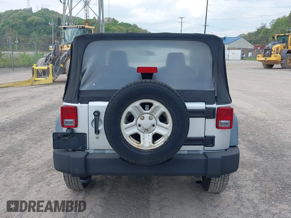2011 Jeep Wrangler Sport with VIN 1J4AA2D18BL546069, listed as a IAAI auction lot 42139693 with 56,395 mi miles and . Bid and sale history available at carsss.com. Image 17.