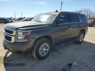 2017 Chevrolet Tahoe Commercial with VIN 1GNSKFEC1HR259975, listed as a Copart auction lot 46692105 with 147,481 mi miles and Salvage title. Bid and sale history available at DreamBid. Image 1.