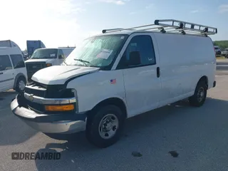 2019 Chevrolet Express Cargo Van with VIN 1GCWGAFG5K1254736, listed as a IAAI auction lot 41880050 with 136,132 mi miles. Bid and sale history available at carsss.com. Image 2.