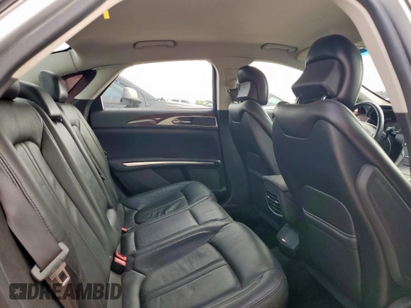 2014 Lincoln MKZ z VIN 3LN6L2G90ER815819, wystawiony jako Copart lot #61189515 z przebiegiem 101 148 mil mil oraz Szkoda całkowita • Salvage title. Historia ofert i sprzedaży dostępna na DreamBid. Obrazek 10.