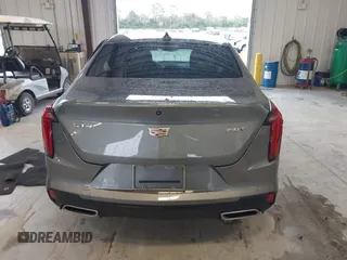 2021 Cadillac CT4 Luxury with VIN 1G6DA5RK4M0147723, listed as a IAAI auction lot 41646082 with 14,459 mi miles and . Bid and sale history available at DreamBid. Image 16.