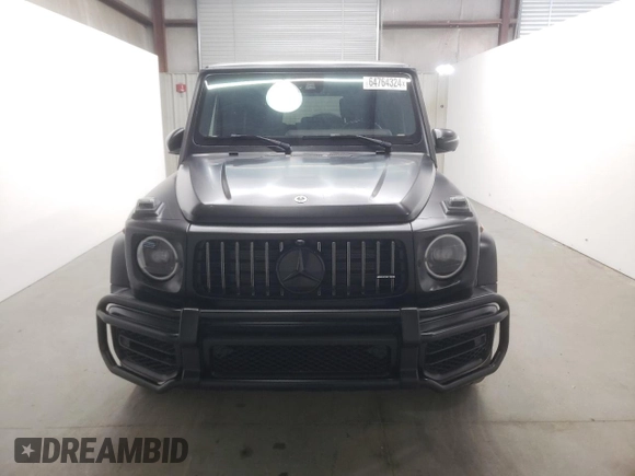 2022 Mercedes-Benz G 63 AMG with VIN W1NYC7HJ2NX444083, listed as a Copart auction lot 64764324 with 7,909 mi miles and Salvage title. Bid and sale history available at DreamBid. Image 5.