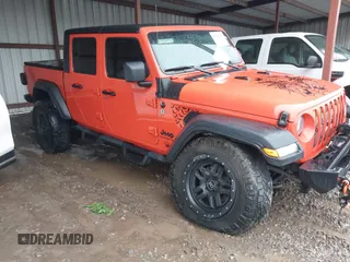 2020 Jeep Gladiator Sport S z VIN 1C6JJTAG4LL177711, wystawiony jako IAAI lot #42222877 z przebiegiem 45 462 mil mil oraz . Historia ofert i sprzedaży dostępna na DreamBid. Obrazek 1.