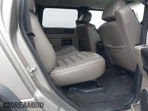 2005 Hummer H2 SUV with VIN 5GRGN23U95H129470, listed as a IAAI auction lot 42046654 with 63,489 mi miles. Bid and sale history available at carsss.com. Image 8.