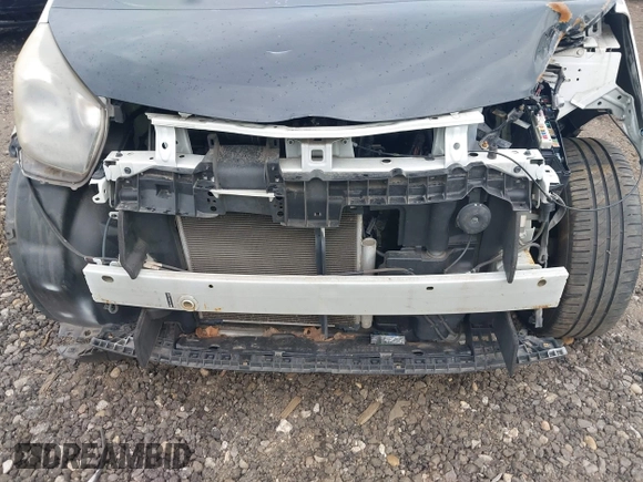 2013 Scion iQ with VIN JTNJJXB06DJ022801, listed as a IAAI auction lot 42152740 with Not provided miles and . Bid and sale history available at DreamBid. Image 10.