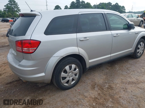2014 Dodge Journey American Value with VIN 3C4PDCAB5ET198704, listed as a IAAI auction lot 42368950 with 220,615 mi miles and . Bid and sale history available at DreamBid. Image 4.