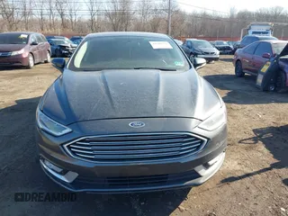 2017 Ford Fusion SE z VIN 3FA6P0HDXHR321008, wystawiony jako IAAI lot #41620779 z przebiegiem 110 116 mil mil oraz . Historia ofert i sprzedaży dostępna na DreamBid. Obrazek 12.