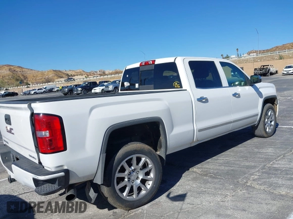 2014 GMC Sierra 1500 Denali z VIN 3GTU2WEJ2EG349289, wystawiony jako IAAI lot #41313698 z przebiegiem 190 441 mil mil oraz . Historia ofert i sprzedaży dostępna na DreamBid. Obrazek 4.