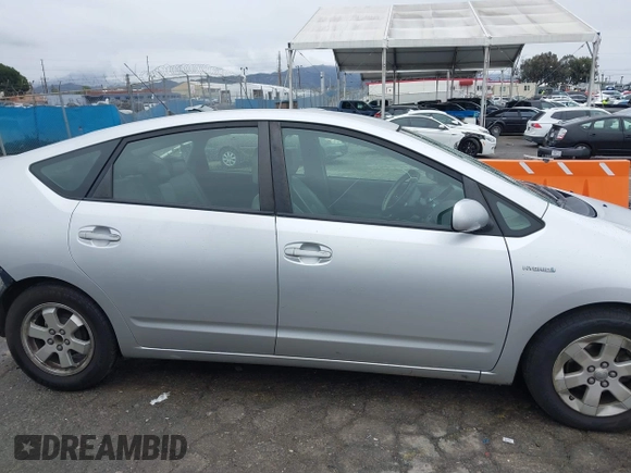 2006 Toyota Prius with VIN JTDKB20U567530398, listed as a IAAI auction lot 41803977 with 246,669 mi miles. Bid and sale history available at carsss.com. Image 13.