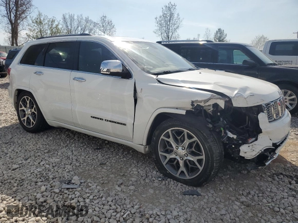 2020 Jeep Grand Cherokee Overland with VIN 1C4RJFCG4LC398526, listed as a Copart auction lot 54221205 with 122,046 mi miles and Salvage Title. Bid and sale history available at DreamBid. Image 4.