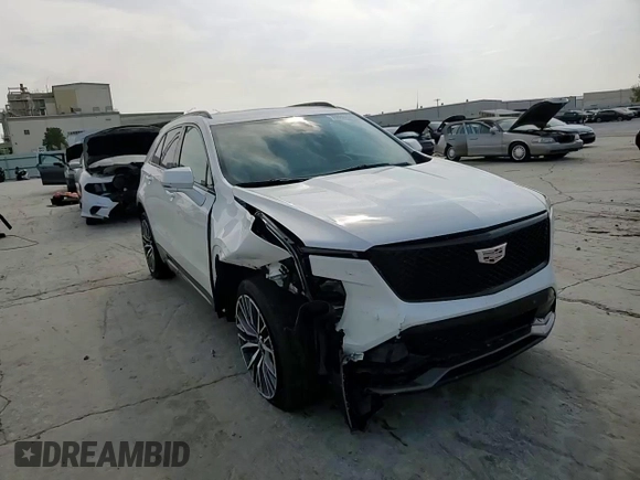 2024 Cadillac XT4 AWD Sport с VIN 1GYFZFR47RF125557, выставлен на аукционе Copart как лот 70869104 с пробегом 8 714 миль миль и Списание • Salvage title. История ставок и продаж доступна на DreamBid. Изображение 12.