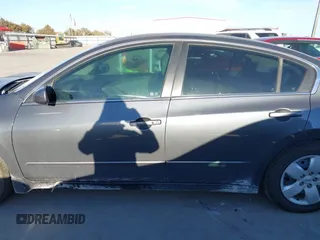 2007 Nissan Altima 2.5 with VIN 1N4AL21E87C213018, listed as a IAAI auction lot 40932058 with 195,817 mi miles. Bid and sale history available at carsss.com. Image 14.