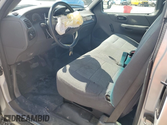 2004 Ford F-150 XL with VIN 2FTRX17W24CA52991, listed as a Copart auction lot 55853095 with 221,452 mi miles and Salvage title. Bid and sale history available at DreamBid. Image 7.