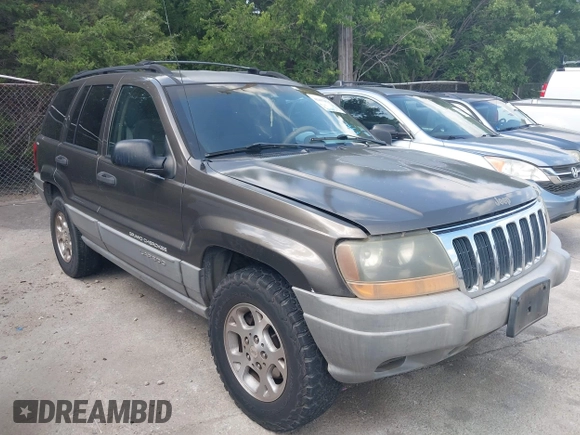1999 Jeep Grand Cherokee Laredo with VIN 1J4GW58S2XC524365, listed as a IAAI auction lot 42432625 with 284,942 mi miles and . Bid and sale history available at DreamBid. Image 1.