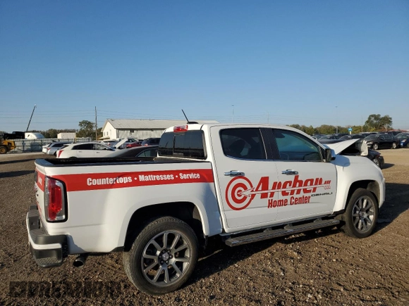 2022 GMC Canyon 4WD Denali with VIN 1GTG6EEN0N1315879, listed as a Copart auction lot 74703684 with 41,897 mi miles and Salvage Title. Bid and sale history available at carsss.com. Image 3.