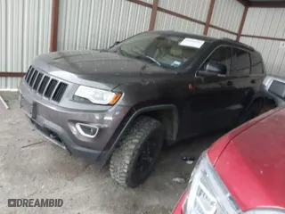 2014 Jeep Grand Cherokee Limited with VIN 1C4RJFBM6EC558383, listed as a IAAI auction lot 41934776 with 219,744 mi miles. Bid and sale history available at carsss.com. Image 2.