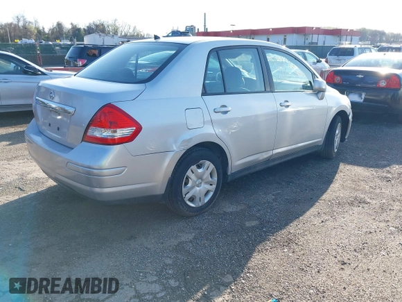 2011 Nissan Versa 1.8 S with VIN 3N1BC1AP5BL432979, listed as a IAAI auction lot 41932890 with 150,041 mi miles. Bid and sale history available at carsss.com. Image 4.