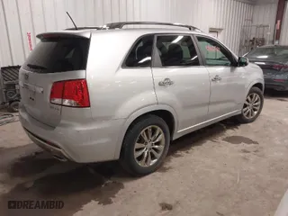 2011 Kia Sorento SX with VIN 5XYKWDA25BG176411, listed as a IAAI auction lot 41986569 with 48,954 mi miles. Bid and sale history available at carsss.com. Image 4.