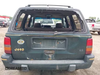 1993 Jeep Grand Cherokee Limited with VIN 1J4GZ78Y2PC540394, listed as a IAAI auction lot 42171655 with 94,417 mi miles and . Bid and sale history available at DreamBid. Image 6.