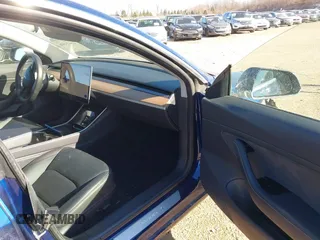 2018 Tesla Model 3 Long Range Battery with VIN 5YJ3E1EA0JF037736, listed as a IAAI auction lot 41423506 with 23,675 mi miles and . Bid and sale history available at DreamBid. Image 5.