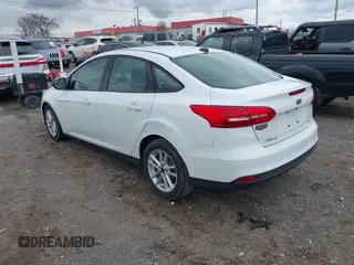 2017 Ford Focus SE with VIN 1FADP3F26HL320298, listed as a IAAI auction lot 41995617 with 128,704 mi miles. Bid and sale history available at carsss.com. Image 3.