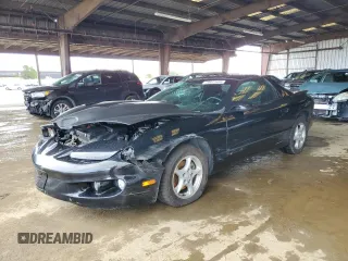 2001 Pontiac Firebird Formula z VIN 2G2FV22G112124266, wystawiony jako Copart lot #79917444 z przebiegiem 124 380 mil mil oraz Szkody całkowita. Historia ofert i sprzedaży dostępna na DreamBid. Obrazek 1.