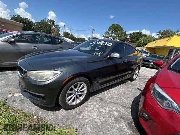 2014 BMW 3 Series 328i Gran Turismo xDrive with VIN WBA3X5C56ED557277, listed as a Copart auction lot 63518355 with 169,897 mi miles and Clean title. Bid and sale history available at DreamBid. Image 2.