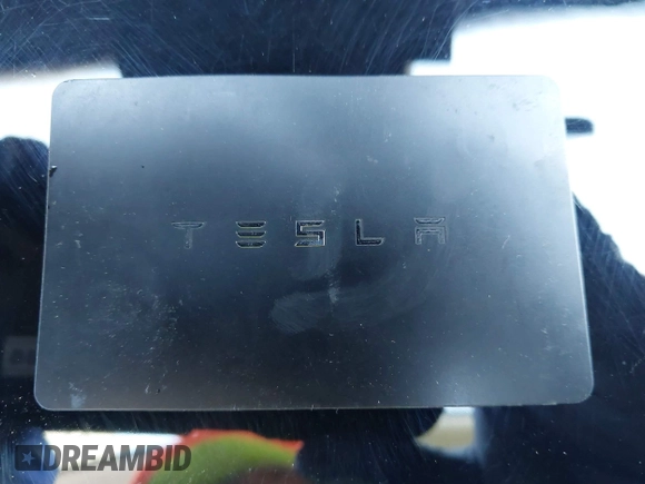 2020 Tesla Model 3 Standard Range Plus with VIN 5YJ3E1EA4LF644967, listed as a IAAI auction lot 41745984 with 23,479 mi miles and . Bid and sale history available at DreamBid. Image 11.