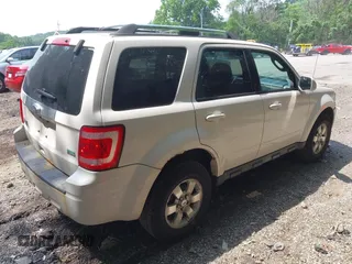 2010 Ford Escape Limited with VIN 1FMCU9EG8AKC42841, listed as a IAAI auction lot 42492355 with 159,939 mi miles and . Bid and sale history available at DreamBid. Image 4.