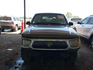 2000 Mercury Mountaineer with VIN 4M2ZU66P0YUJ13268, listed as a IAAI auction lot 42271864 with 243,104 mi miles and . Bid and sale history available at DreamBid. Image 13.