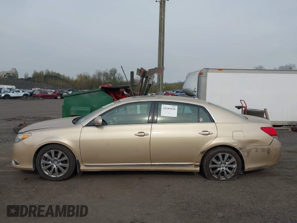 2011 Toyota Avalon with VIN 4T1BK3DB5BU414687, listed as a IAAI auction lot 42103830 with 130,045 mi miles and . Bid and sale history available at carsss.com. Image 14.