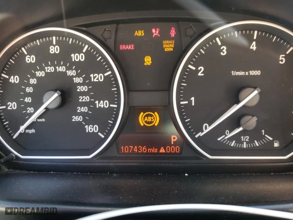 2012 BMW 1 Series 128i with VIN WBAUL7C53CVM83027, listed as a Copart auction lot 48802675 with 107,436 mi miles and Clean Title. Bid and sale history available at carsss.com. Image 9.