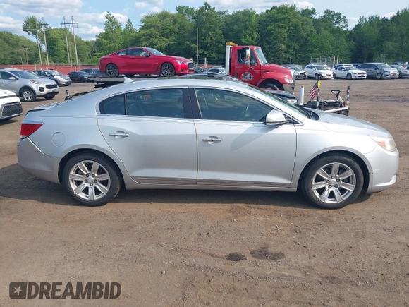 2012 Buick LaCrosse Premium 1 z VIN 1G4GD5E33CF181997, wystawiony jako IAAI lot #42411613 z przebiegiem 59 246 mil mil oraz . Historia ofert i sprzedaży dostępna na DreamBid. Obrazek 13.